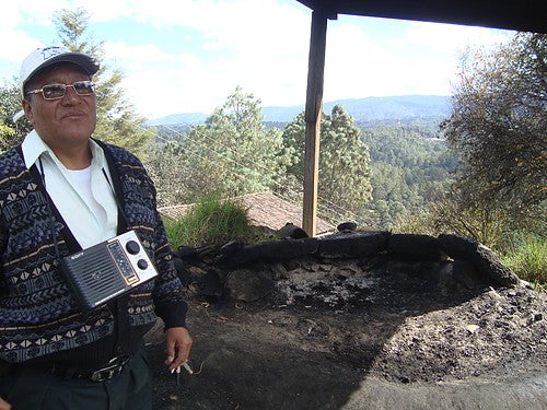 Julian Velasquez in front of a sacred prayer site