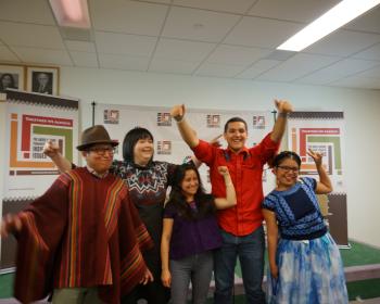 Members of the Global Indigenous Youth Caucus in a celebratory moment.