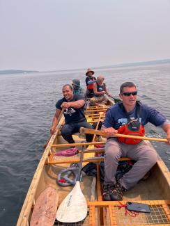 Paddling into the Narragansett Bay with Norman Machado member the Narragansett Indian Tribe. Photo taken by Chenae Bullock