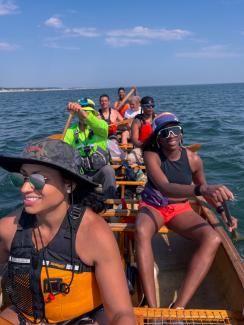 Paddling to Kingston, MA with a full crew. Photo by Chenae Bullock